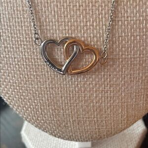Silver and Gold Heart Necklace, Says “I Love You”
